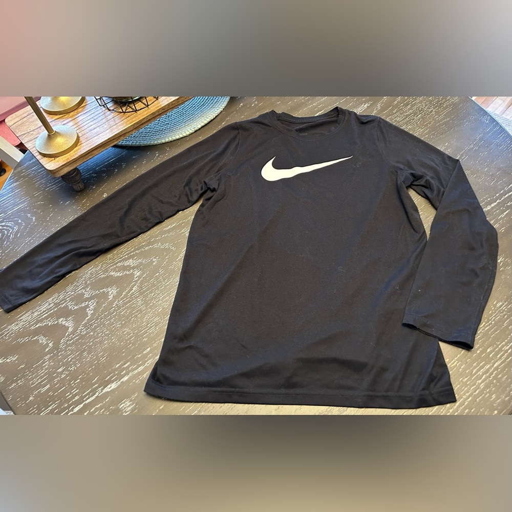 Youth size Large, Nike Dri-Fit lightweight, long sleeved tee.  Very soft.